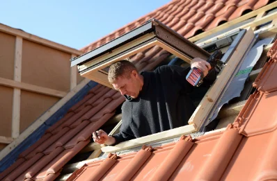 Pose de fenêtres de toit Velux au Titre
